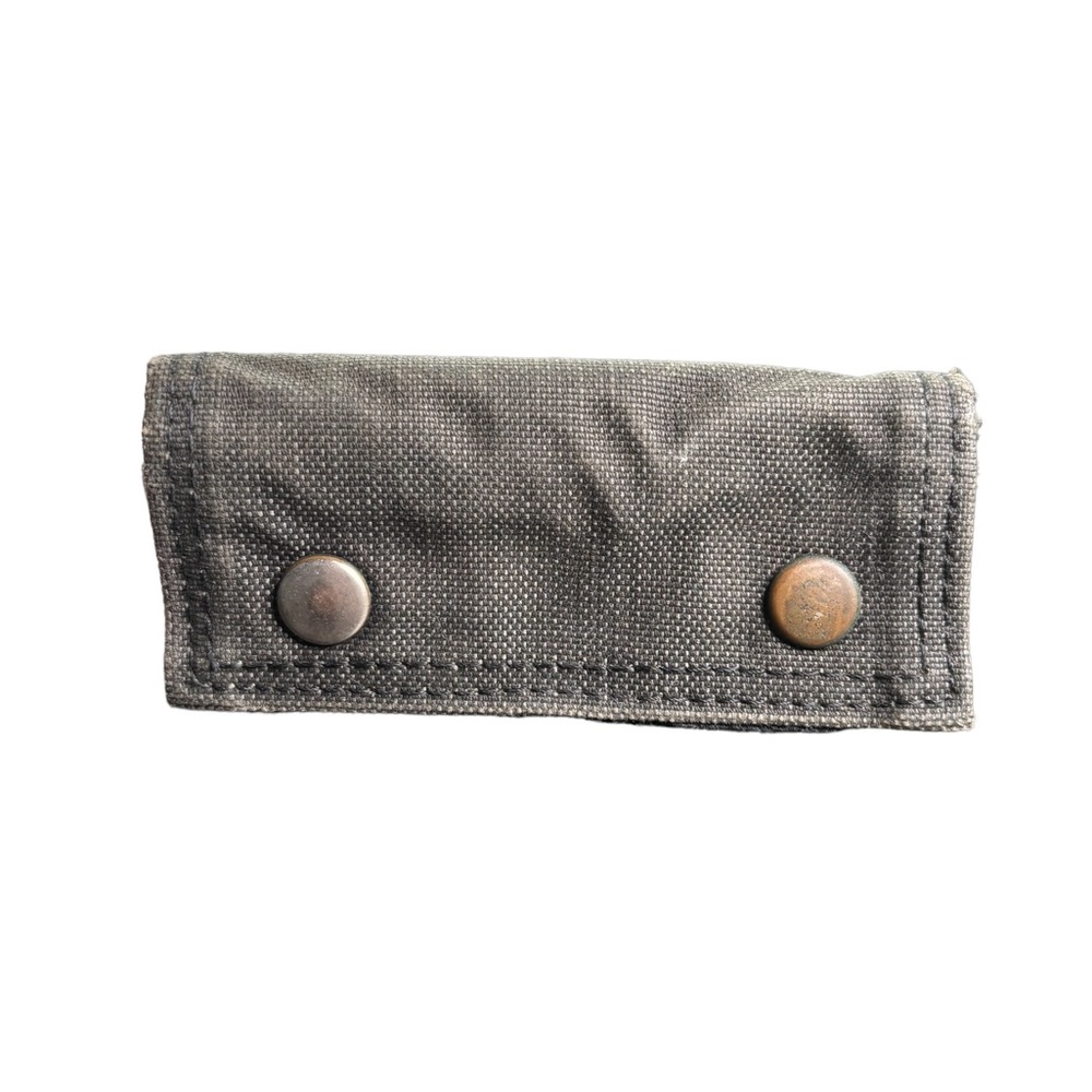 Denim key case holder. Missing one key holder. In good used condition